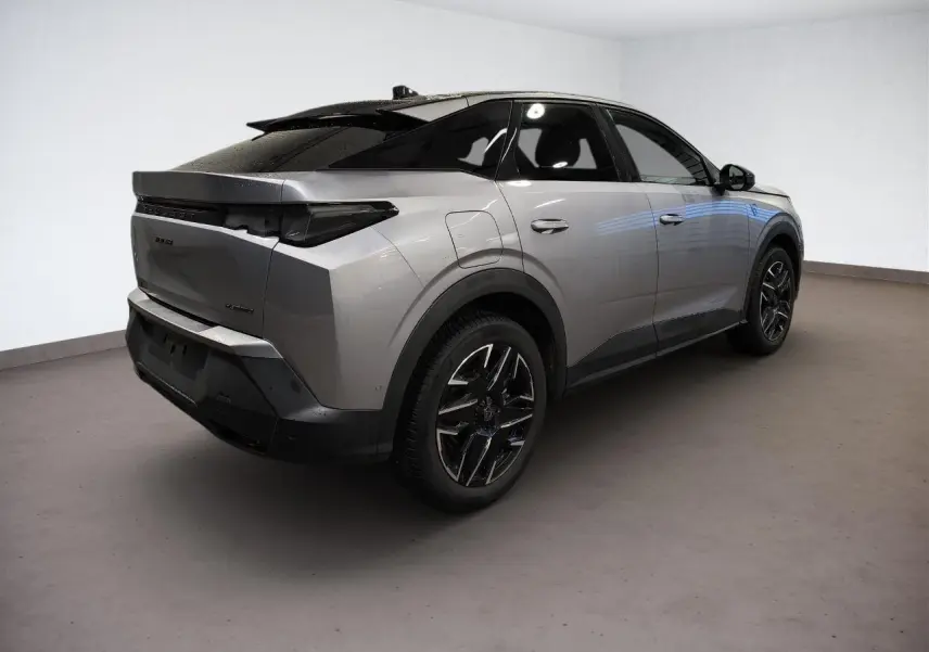 Peugeot 3008 Hybrid gris Artense vue 3/4 arrière droit avec toit noir et jantes alliage noires.