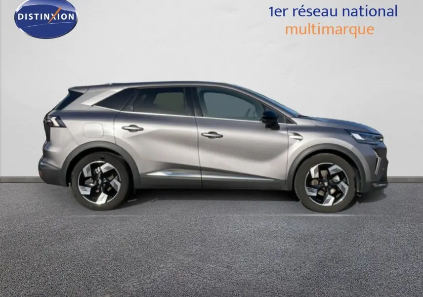 Profil droit d'un Renault Symbioz 2025 gris cassiopée métallisé avec jantes noires et détails chromés.