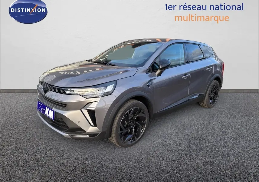 Renault Symbioz gris cassiopée métal en 3/4 avant droit, avec jantes noires et lignes modernes visibles.