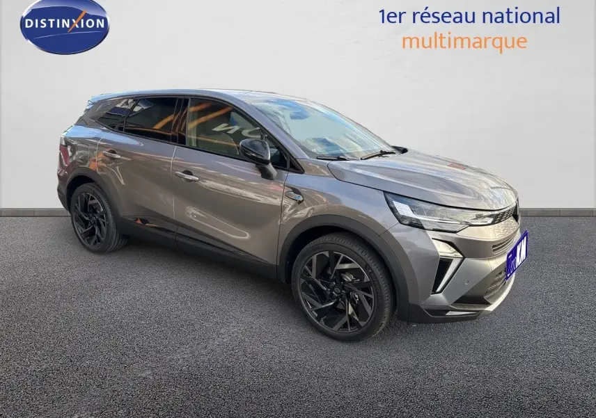 Renault Symbioz gris cassiopée métal en 3/4 avant droit avec jantes noires et lignes modernes.