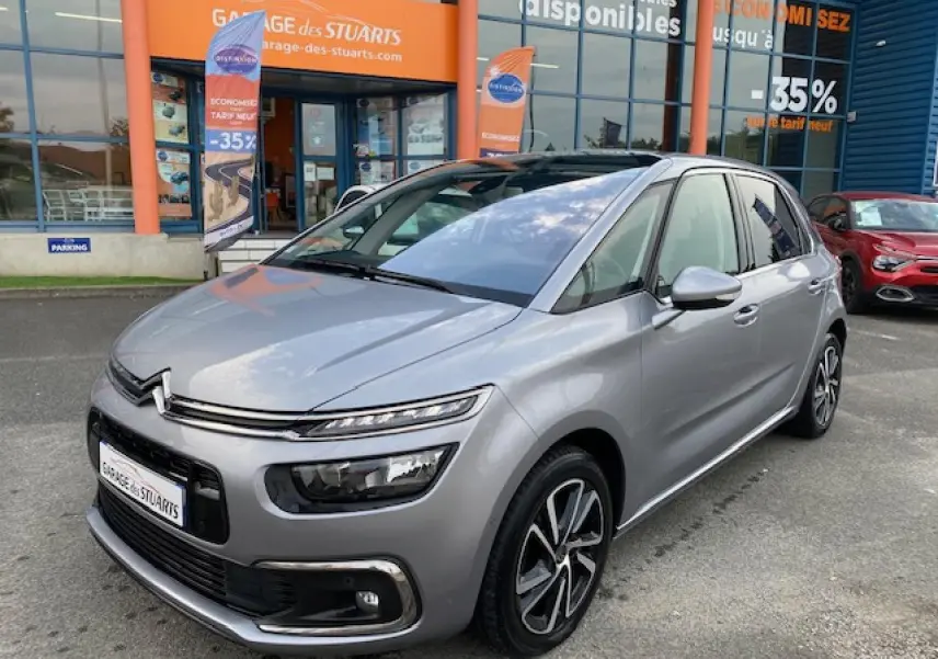 Citroën C4 Spacetourer gris Artense vue 3/4 avant avec jantes alliage bi-ton et signature lumineuse LED.