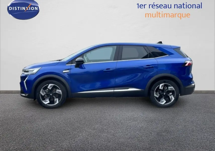 Renault Symbioz E-Tech Full Hybrid 145ch Iconic bleu Iron Metal en profil droit, soulignant ses jantes modernes et lignes dynamiques.