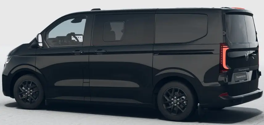 Volkswagen Transporter ProCab noir métallisé vu de profil côté gauche avec jantes alliage noires et vitres arrière teintées.