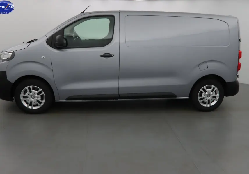 Profil côté gauche du Peugeot Expert Fourgon gris Artense 2022, avec porte coulissante et jantes acier.