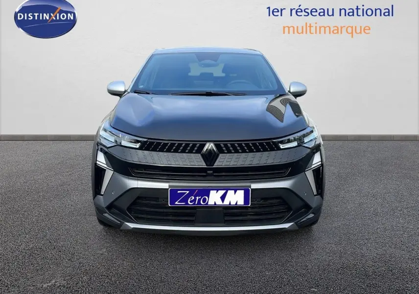 Vue frontale d'un Renault Captur 2025 noir étoile métal avec toit gris, mettant en valeur sa calandre moderne et ses phares LED.