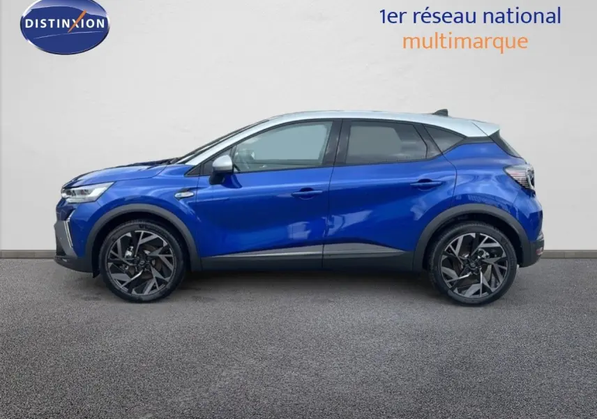 Vue latérale droite d'un Renault Captur E-Tech hybride bleu Iron Metal avec toit gris, jantes noires stylisées.
