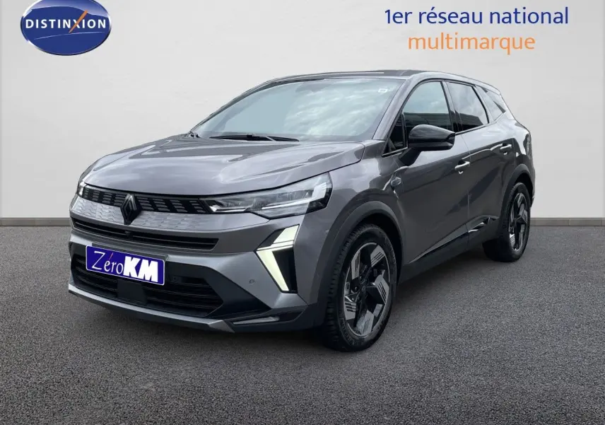 Renault Symbioz gris cassiopée métal en 3/4 avant droit, SUV hybride au design moderne et feux LED distinctifs.