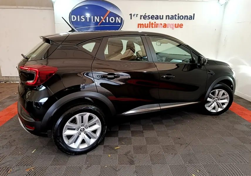 Renault Captur Business TCe 90 2021 noir, vue profil côté gauche, jantes alliage et feux arrière LED visibles.