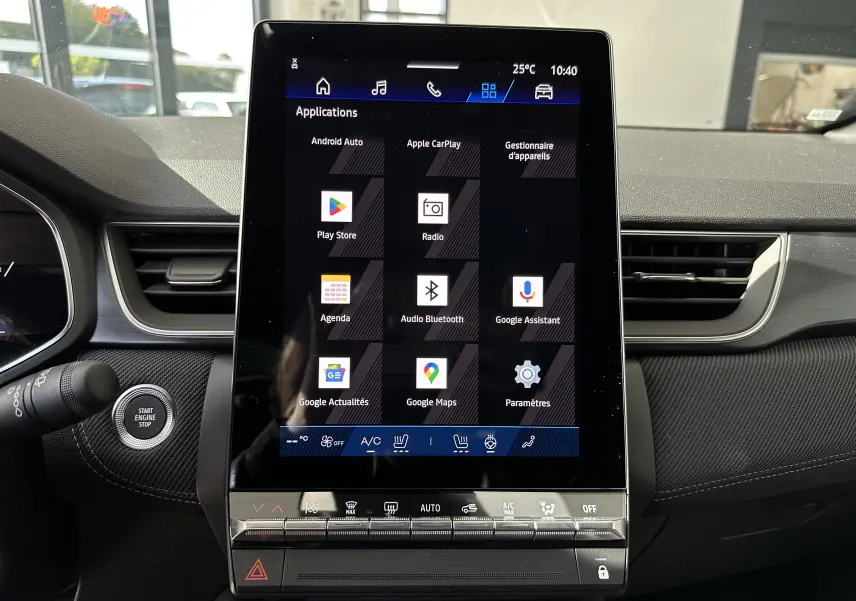 Écran central tactile vertical du Renault Symbioz Esprit Alpine gris Cassiopée, affichant les applications connectées.