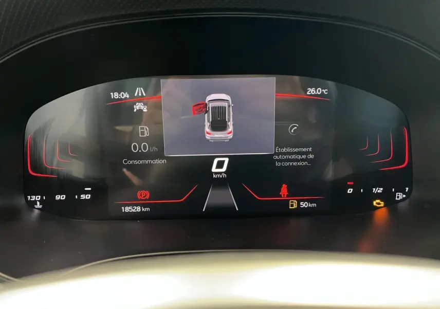 Combiné d'instruments digital du SEAT Arona 2024 affichant porte ouverte et vitesse à 0 km/h.