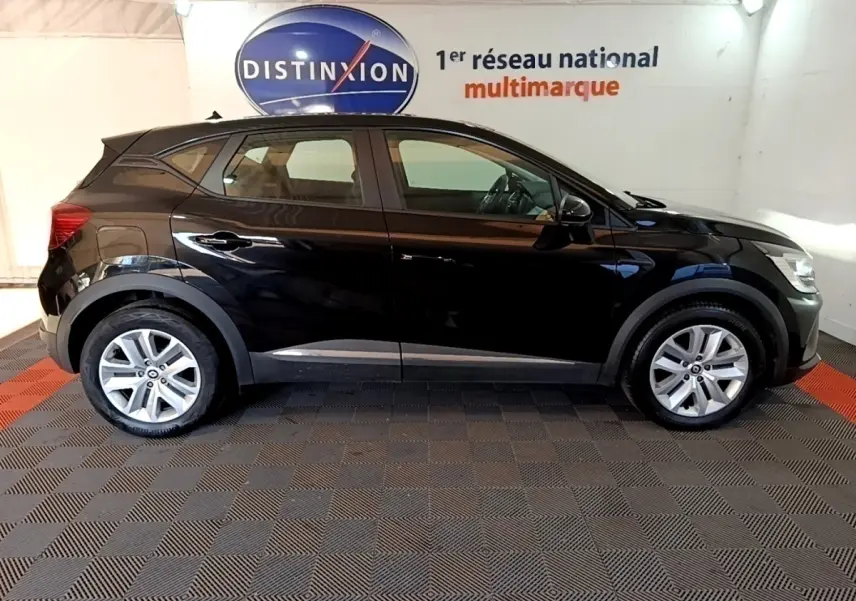 Profil droit d'un Renault Captur Business noir 2021, avec jantes alliage et rétroviseurs noirs brillants.