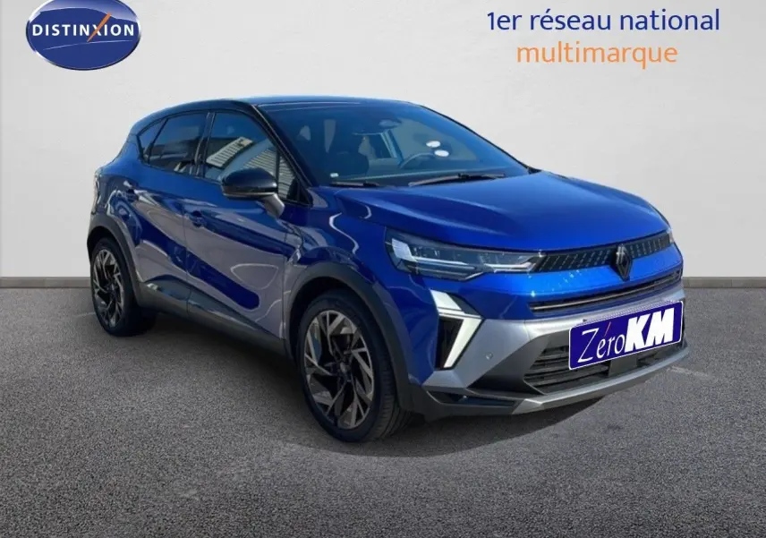 Renault Captur E-Tech hybride 2025 bleu Iron Metal avec toit noir, vue 3/4 avant mettant en valeur ses optiques LED et jantes noires.