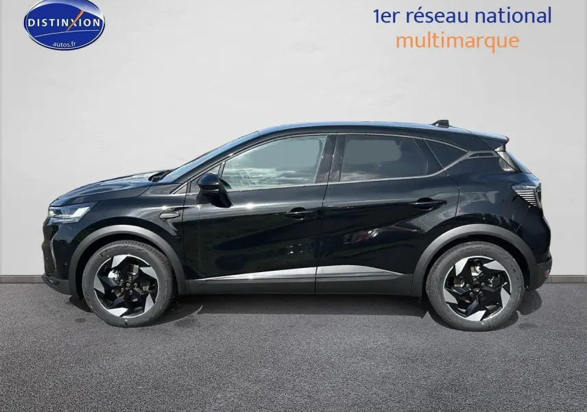 Profil côté gauche du Renault Captur 1.6 e-tech hybride 145 techno noir étoile avec jantes alu bicolores.