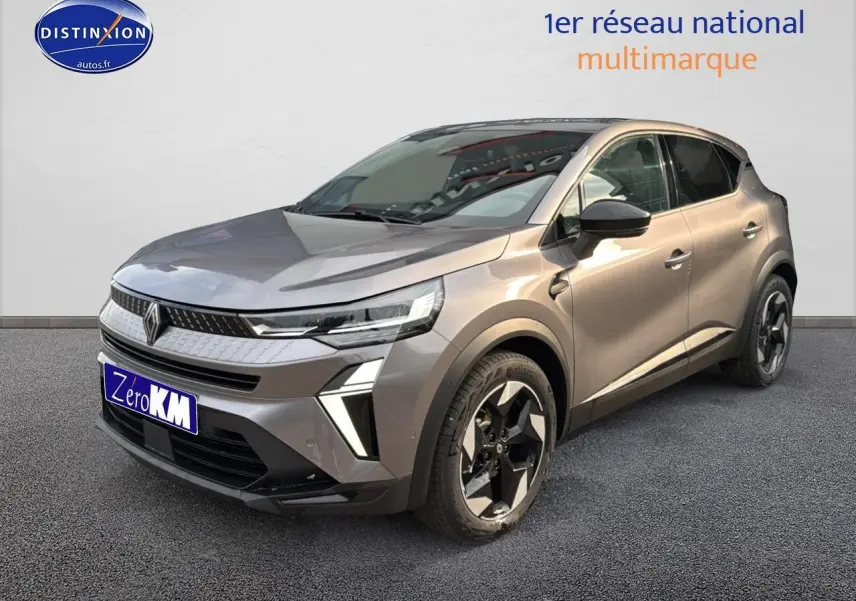 Renault Captur 1.6 e-tech hybride gris cassiopée en 3/4 avant droit avec jantes alu et feux LED distinctifs.