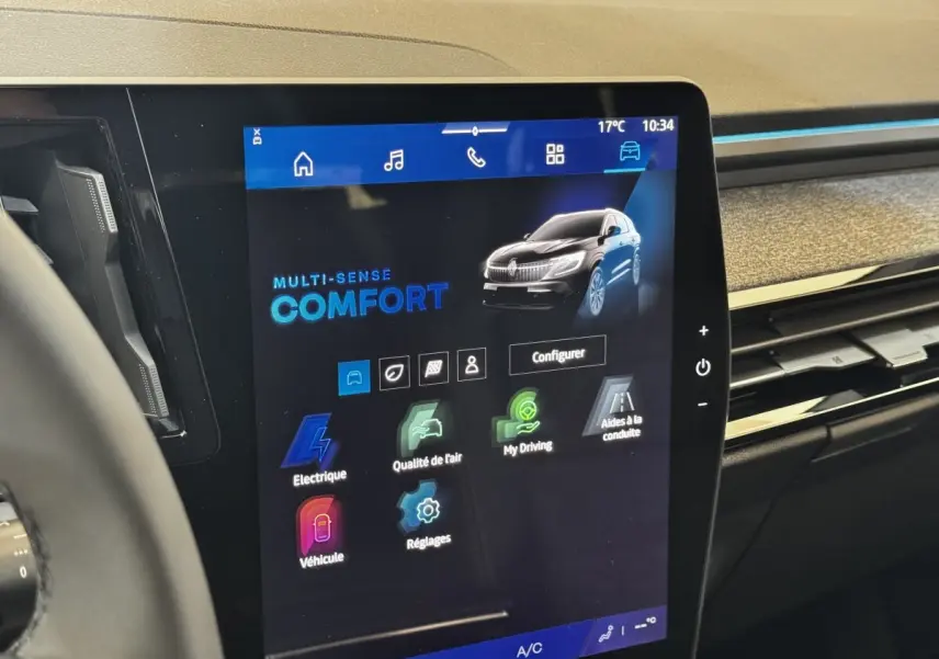 Écran tactile central affichant les modes de conduite du Renault Espace noir, vue intérieure du tableau de bord.