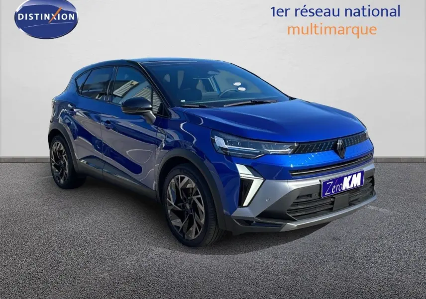 Renault Captur E-Tech hybride bleu Iron Metal avec toit noir, vue 3/4 avant mettant en valeur ses optiques LED et jantes noires.