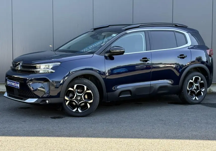 Citroën C5 Aircross Hybrid bleu Eclipse en profil droit, avec jantes alliage bi-ton et protections Airbump noires.