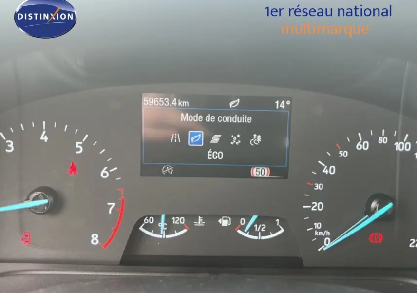 Tableau de bord du Ford Puma gris 2021, affichage du mode de conduite Éco et compteur kilométrique à 59 653 km.