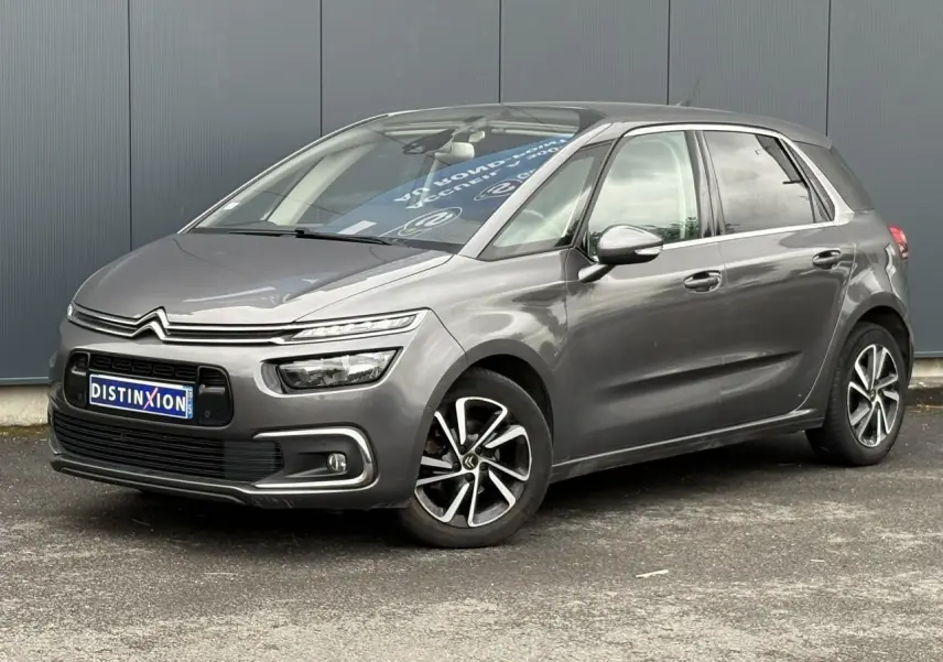 Citroën C4 Spacetourer gris foncé vue 3/4 avant droit avec jantes alliage et feux LED distinctifs.