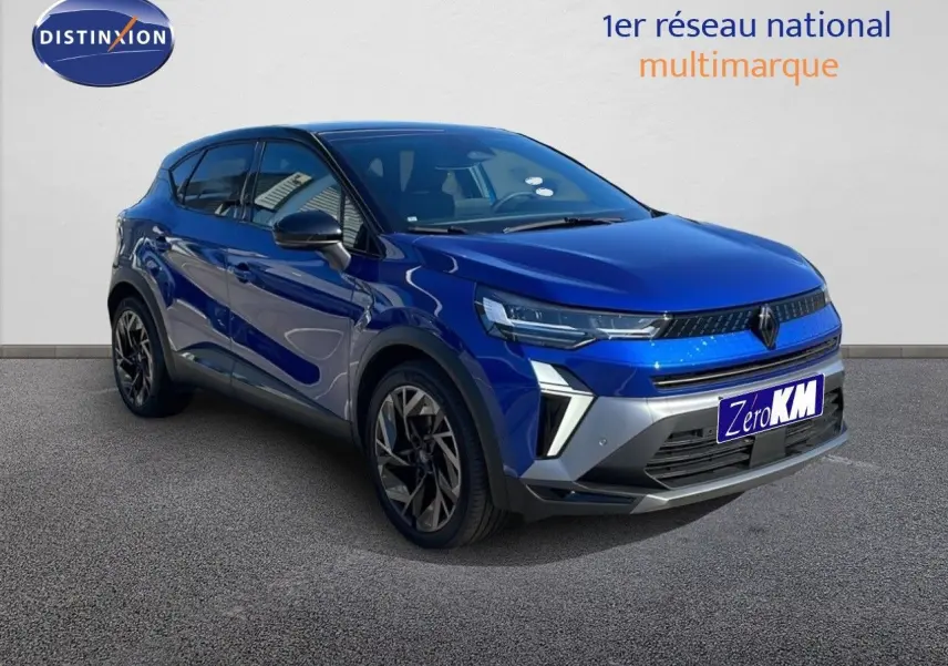 Renault Captur E-Tech hybride 2025 bleu Iron Metal avec toit noir, vue 3/4 avant droit mettant en valeur ses phares LED.
