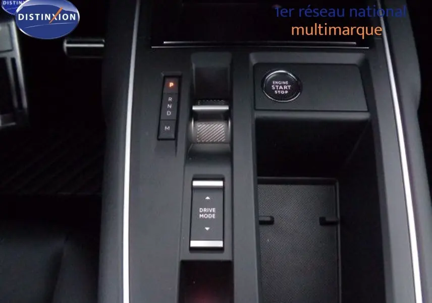Vue rapprochée de la console centrale du Citroën C5 Aircross gris Artense, avec sélecteur de boîte auto et bouton start/stop.