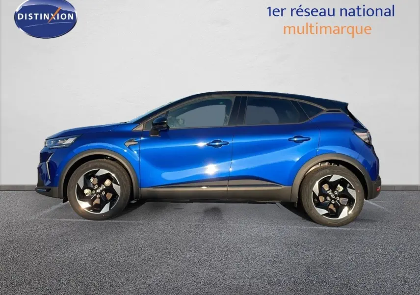 Profil côté gauche du Renault Captur E-Tech hybride 2025 en bleu Iron Metal avec toit noir et jantes stylisées.