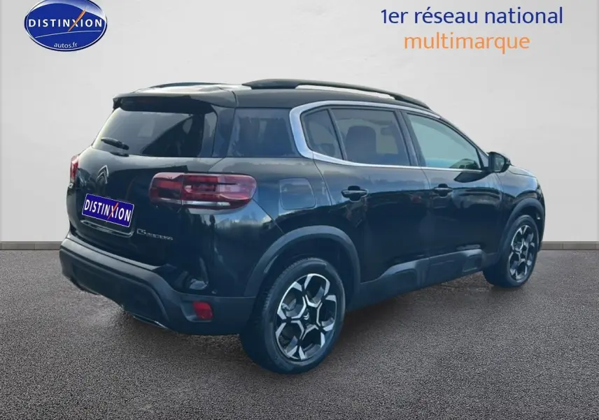 SUV Citroën C5 Aircross noir vue 3/4 arrière droit, jantes alu et vitres arrière teintées visibles.