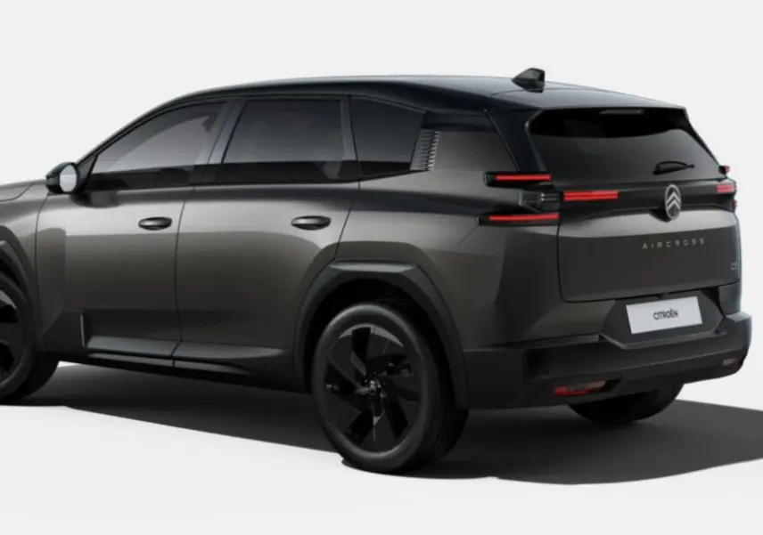 Vue 3/4 arrière droite du Citroën C5 Aircross gris Platinium avec toit noir et feux arrière LED distinctifs.