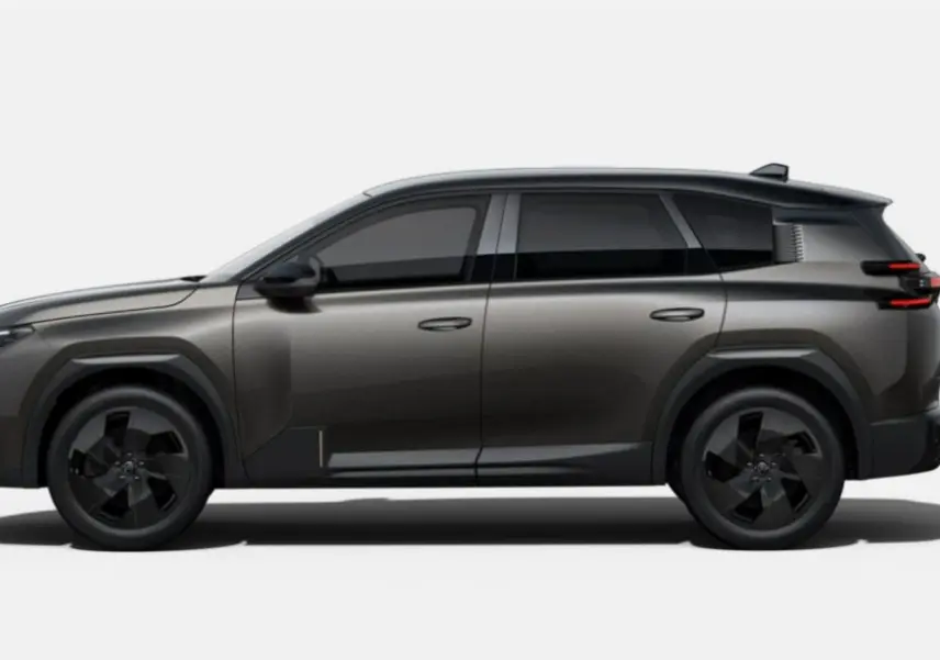 Vue de profil côté gauche du Citroën C5 Aircross II Hybrid 145 en gris Platinium avec toit noir biton.