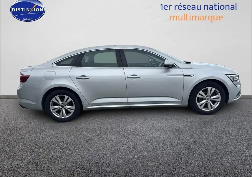 Profil latéral droit de la Renault Talisman gris alu 2020, soulignant ses lignes élégantes et jantes alu.
