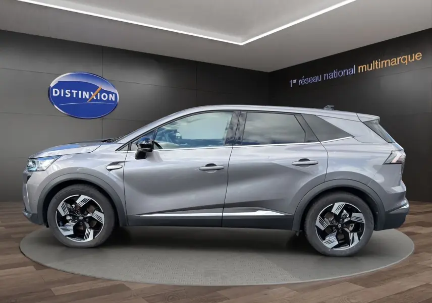 Renault SYMBIOZ gris clair en vue profil côté gauche, avec jantes modernes et lignes dynamiques.