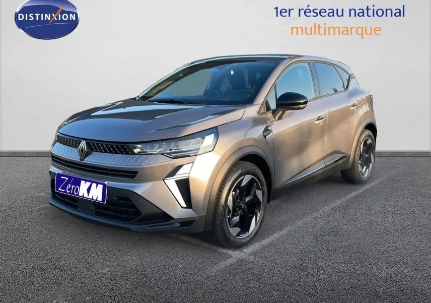 Renault Captur E-Tech hybride gris cassiopée métal, vue 3/4 avant droit avec jantes noires bicolores.
