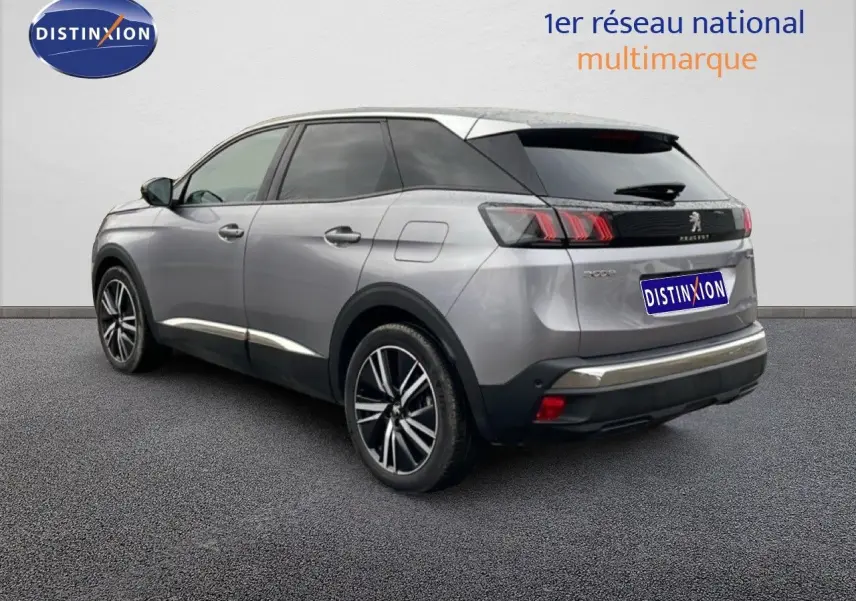 PEUGEOT 3008 hybride rechargeable gris Artense, vue 3/4 arrière droit avec jantes bi-ton et feux LED distinctifs.