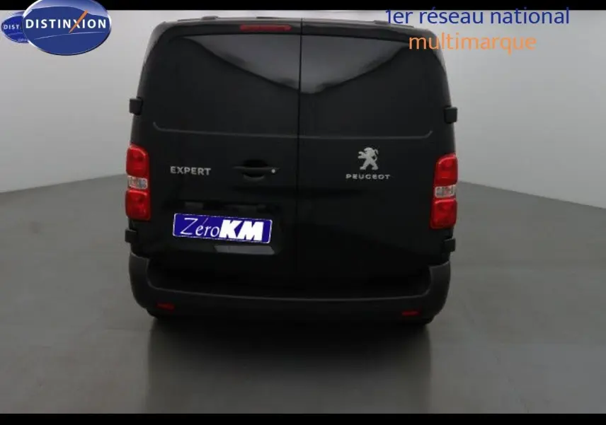 Vue arrière du Peugeot Expert Fourgon noir métal 2022 avec portes battantes et feux rouges visibles.