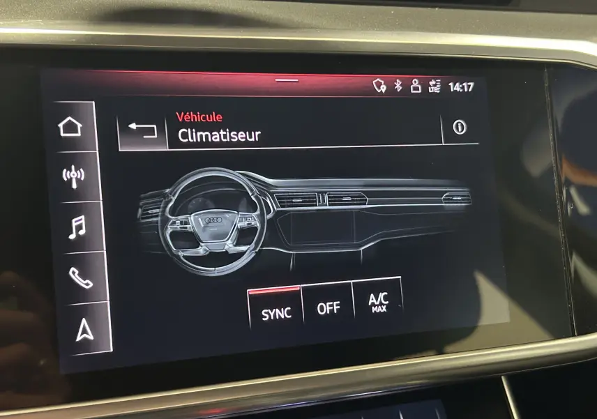 Écran tactile intérieur montrant le menu climatisation du tableau de bord de l'Audi A6 Avant 2019.