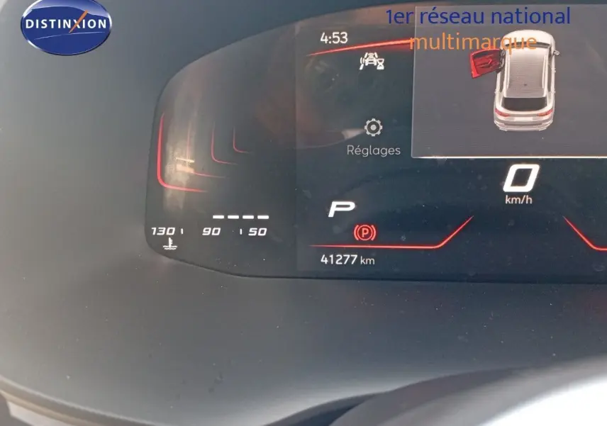 Tableau de bord numérique du SEAT Ateca 2023 montrant l'affichage de la vitesse à 0 km/h et l'alerte porte ouverte côté gauche.