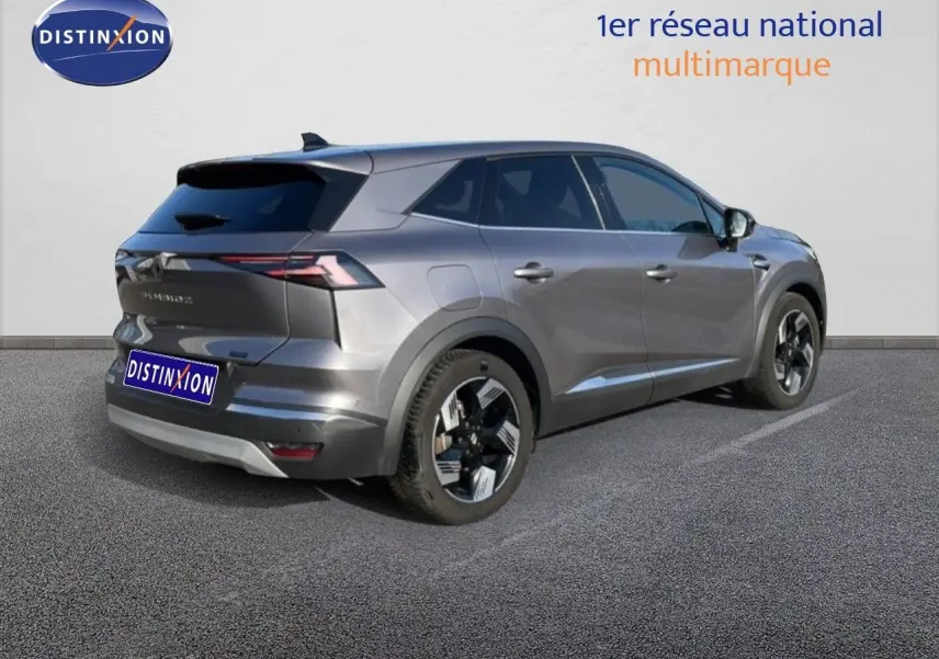 Renault Symbioz gris cassiopée métal, vue 3/4 arrière droit, SUV hybride avec jantes modernes et feux LED fins.