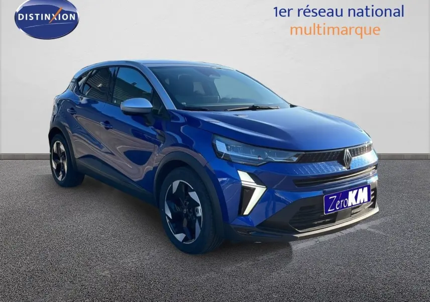 Renault Captur E-Tech hybride bleu Iron métal avec toit gris, vue 3/4 avant mettant en valeur ses phares LED distinctifs.