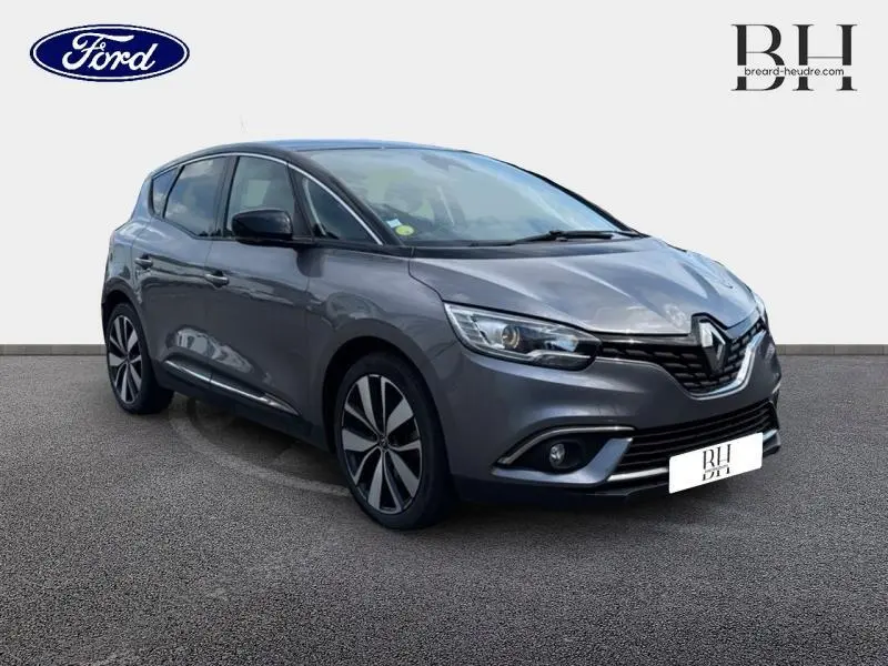 Renault Scénic 1.7 Blue dCi 120ch Limited gris Cassiopée/Noir Étoilé en 3/4 avant droit avec jantes alu distinctives.