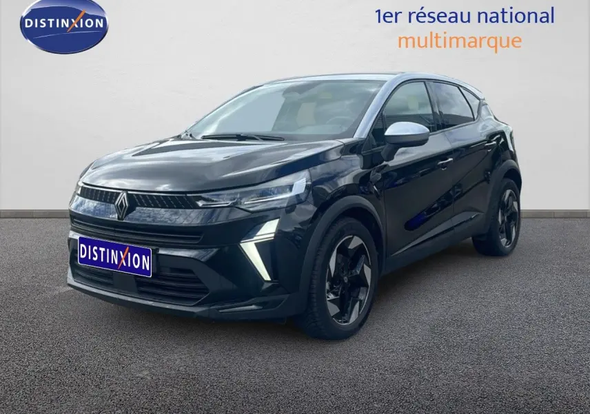Renault Captur 2025 noir étoile métal avec toit gris, vue 3/4 avant mettant en valeur ses feux LED et jantes biton.