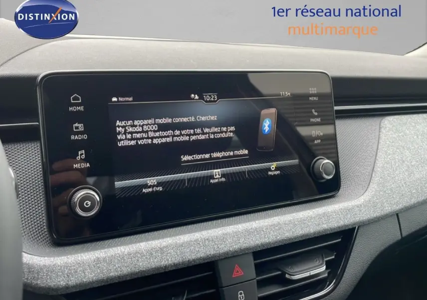 Écran tactile central du tableau de bord du Skoda Kamiq 2025, finition gris graphite, affichant le menu Bluetooth.