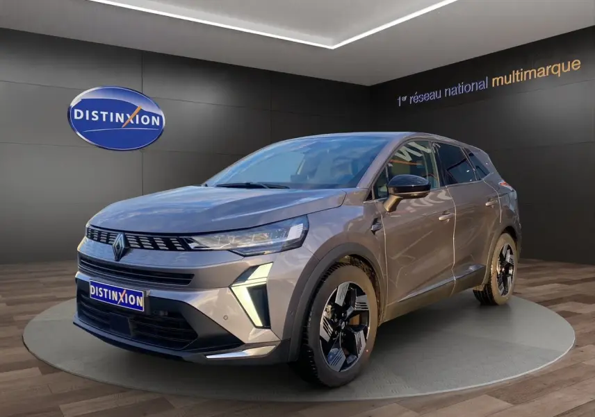 Renault Symbioz E-Tech Full Hybrid gris Casiopee, vue 3/4 avant avec feux LED et jantes alliage 18 pouces.