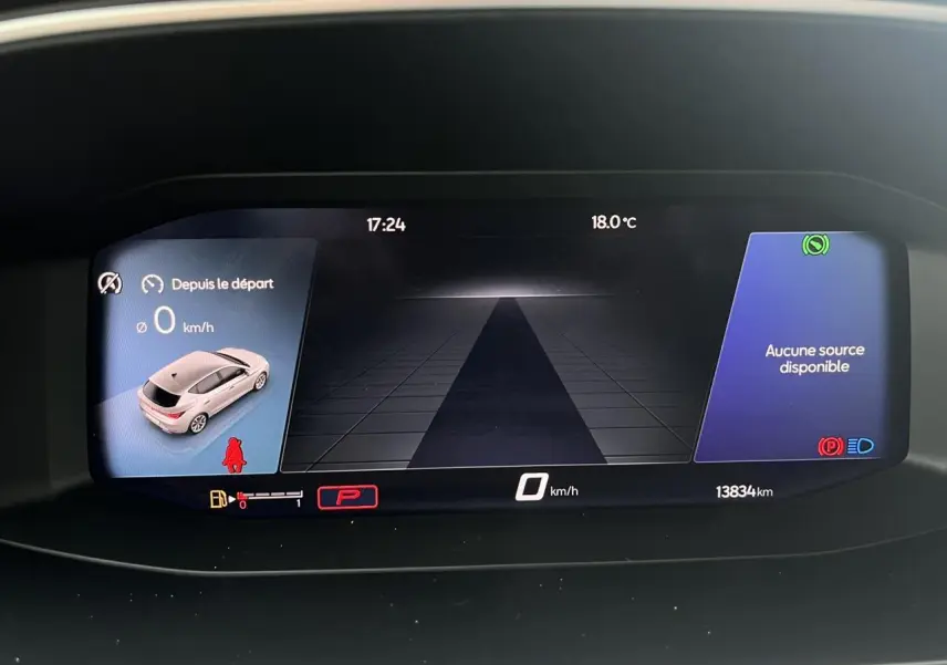 Affichage numérique du tableau de bord du SEAT LEON 2.0 TDI 150 DSG Style, indiquant 0 km/h et 13834 km parcourus.