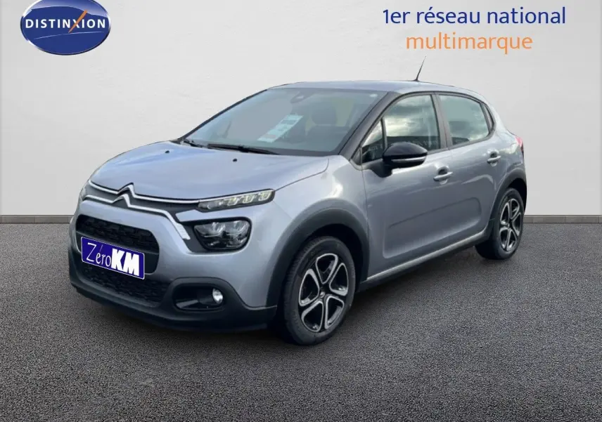 Citroën C3 gris Artense métal vue 3/4 avant droit avec phares LED et jantes alliage distinctives.