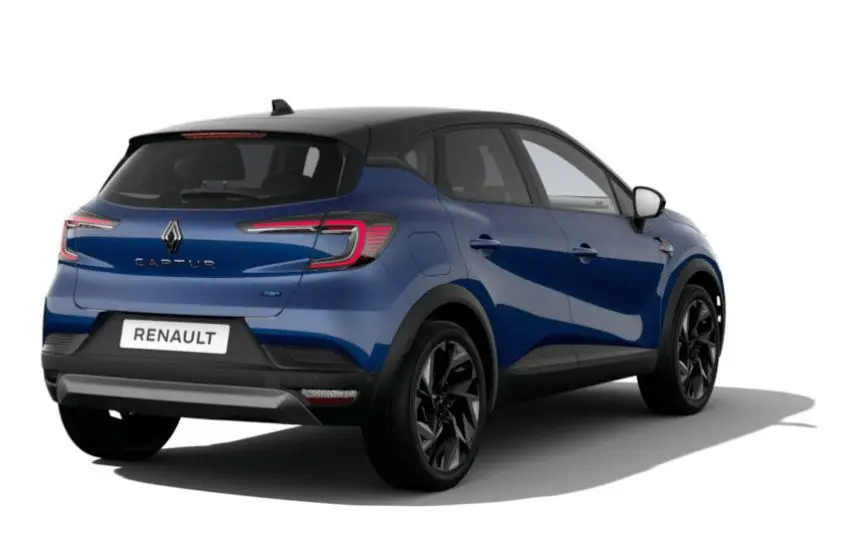 Vue 3/4 arrière droite du Renault Captur 2025 bleu Iron avec toit noir étoilé et jantes noires.
