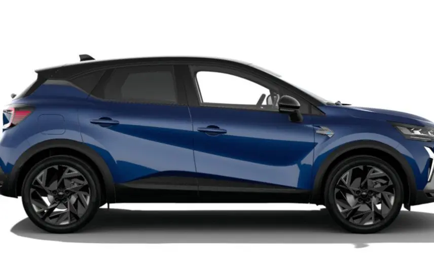 Profil côté gauche du Renault Captur 2025 hybride en bleu Iron avec toit noir étoilé et jantes noires.