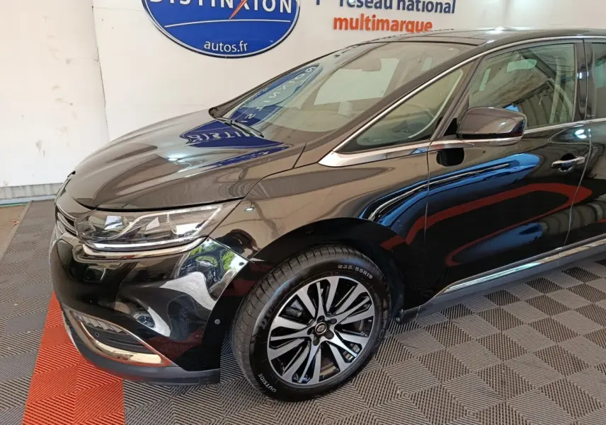 Vue 3/4 avant côté gauche d'un Renault Espace noir brillant avec jantes alliage et phares LED distinctifs.