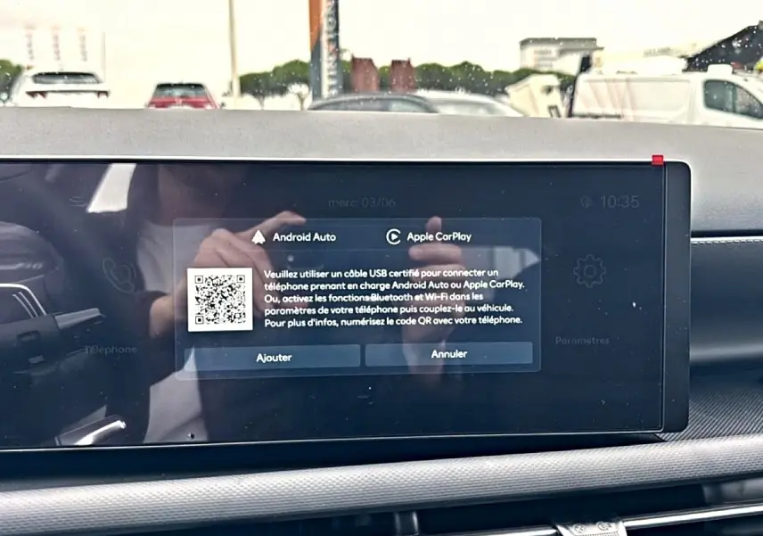 Écran tactile central du tableau de bord du Hyundai Tucson 2026 affichant les options Android Auto et Apple CarPlay.