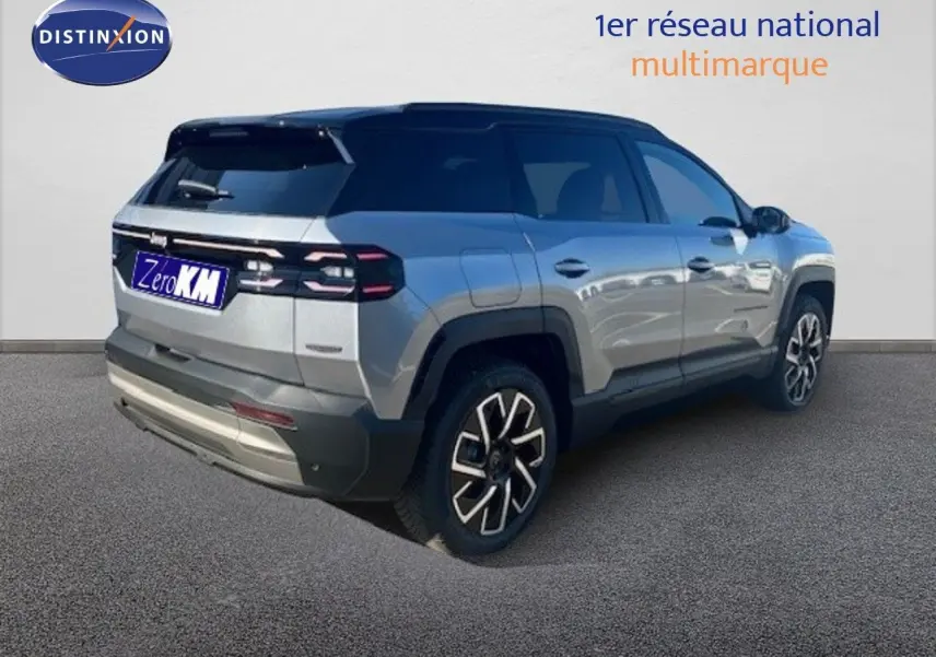 Jeep Compass MHEV 145ch Summit gris Yosemite métal avec toit noir, vue 3/4 arrière droit mettant en valeur les feux LED et jantes.