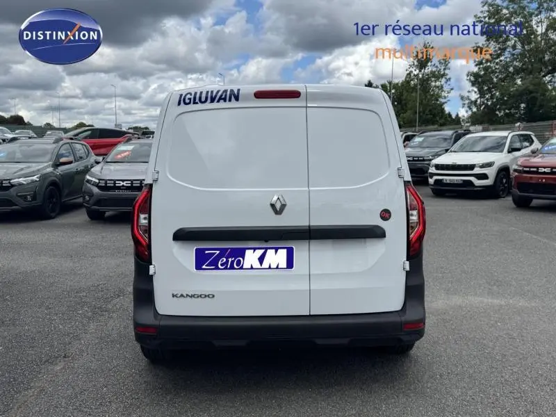 Vue arrière d'un Renault Kangoo Van blanc avec porte latérale et logo IGLUVAN sur le hayon.
